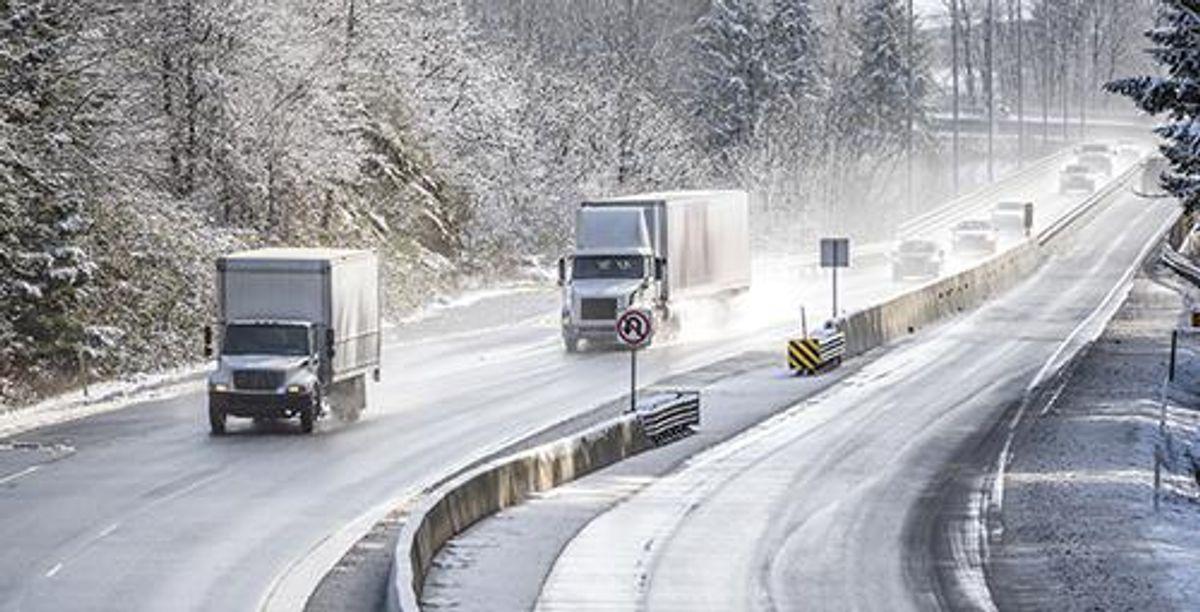 trucks driving on winter roads